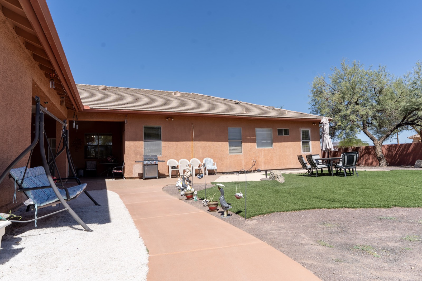 Desert gardens and outdoor seating at Grace Hill Ranch